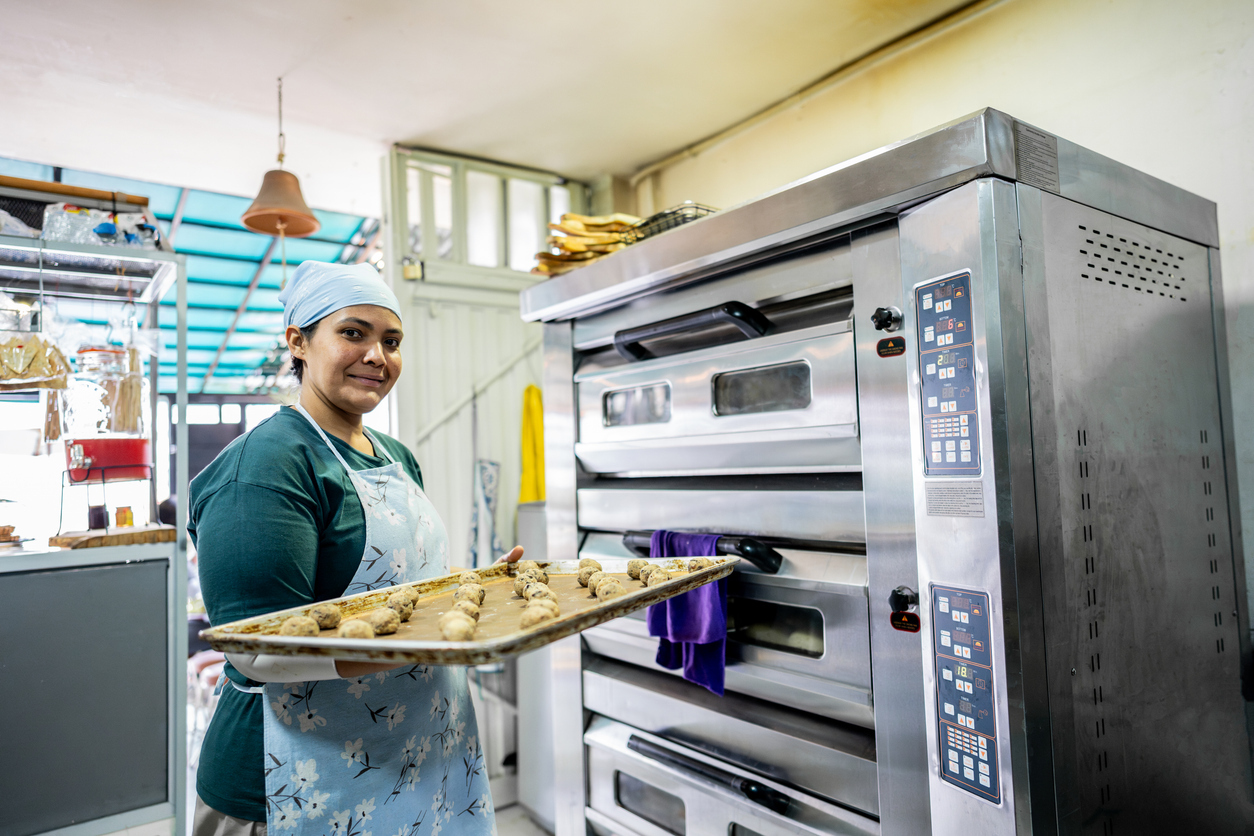 A baker at work in her kitchen
